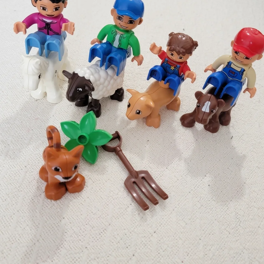 Lego Farmers set with 10 figures, including a farmer, farmer's wife, and 2 kids,
